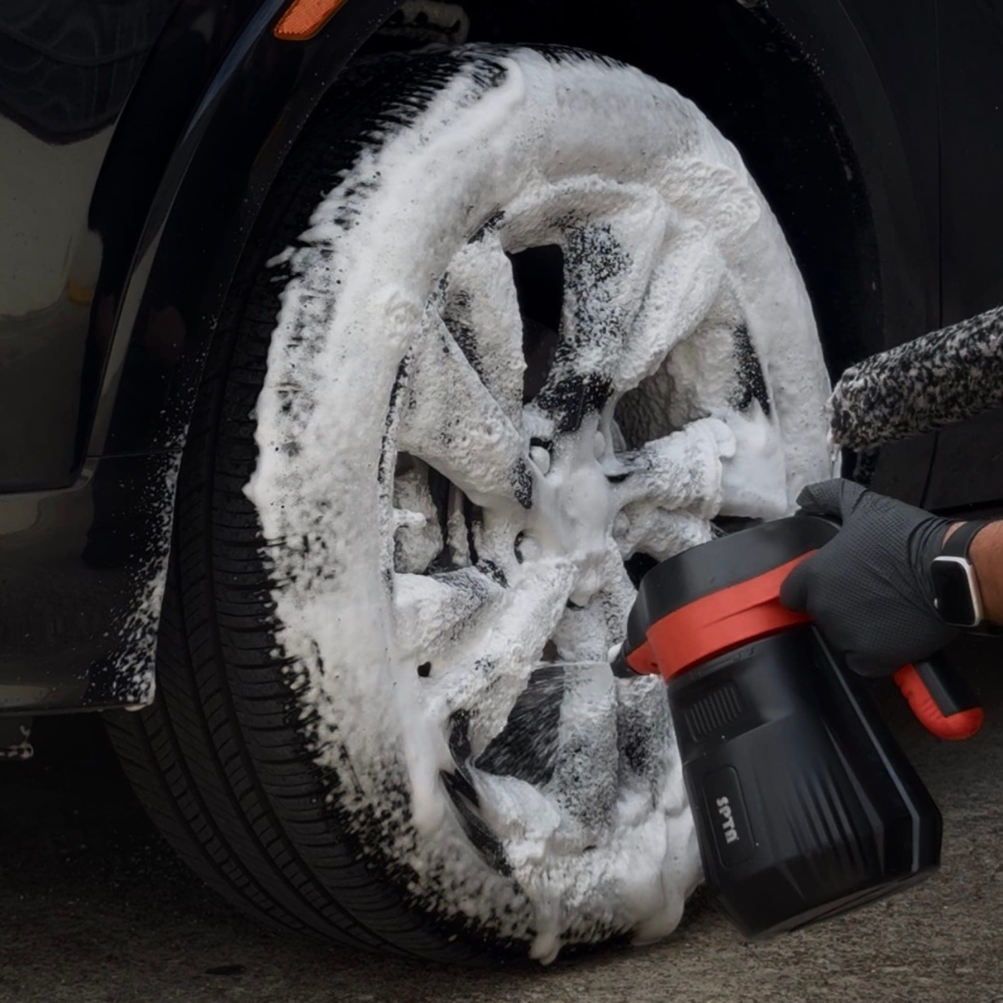 wheel covered in foam during a blackline exterior wash