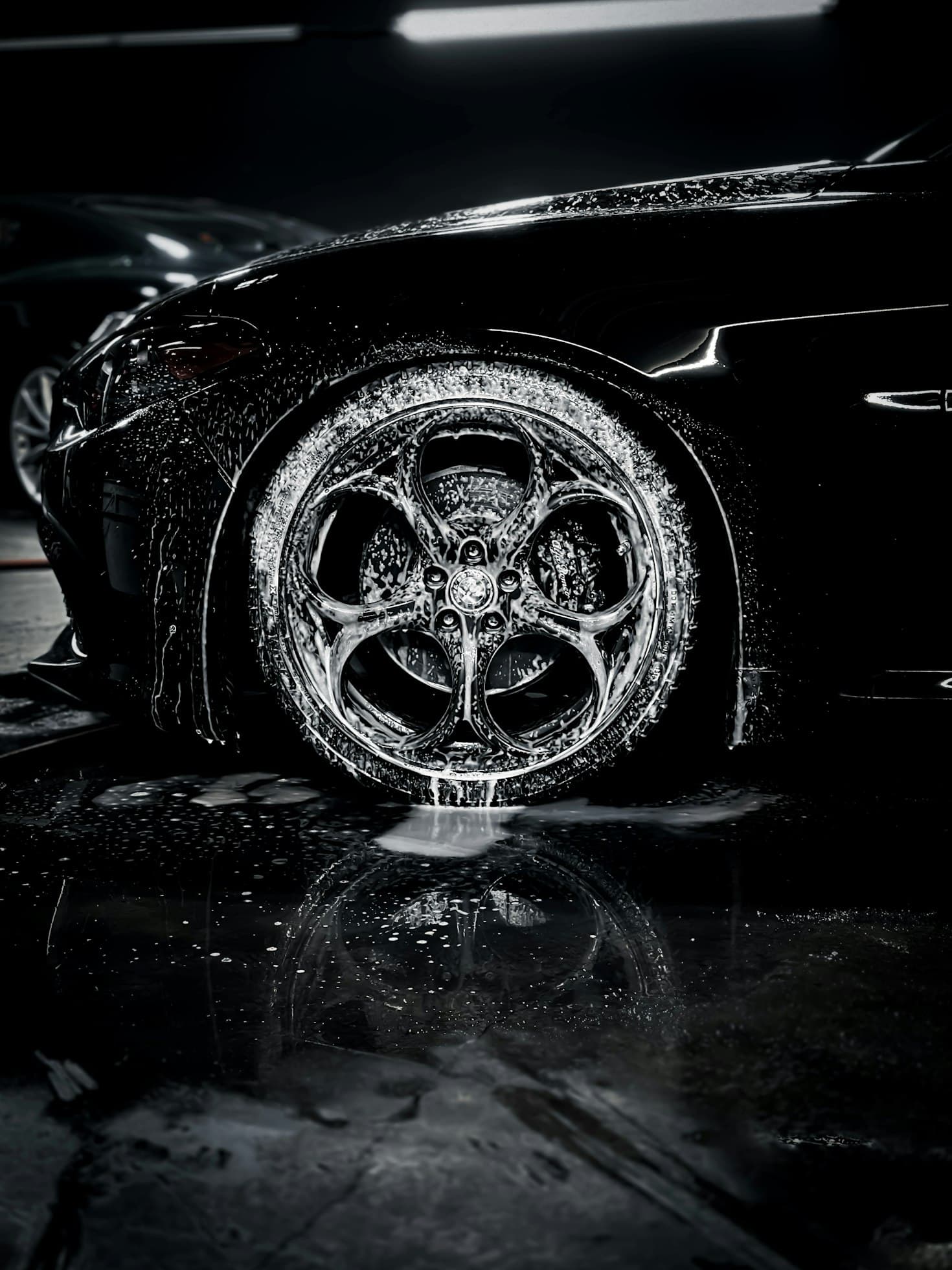 soapy wheel during a blackline exterior detail